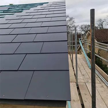 the roof of a building that has a lot of solar panels on it