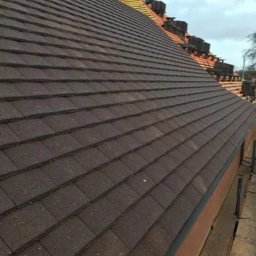 a roof that has a bunch of air conditioners on top of it